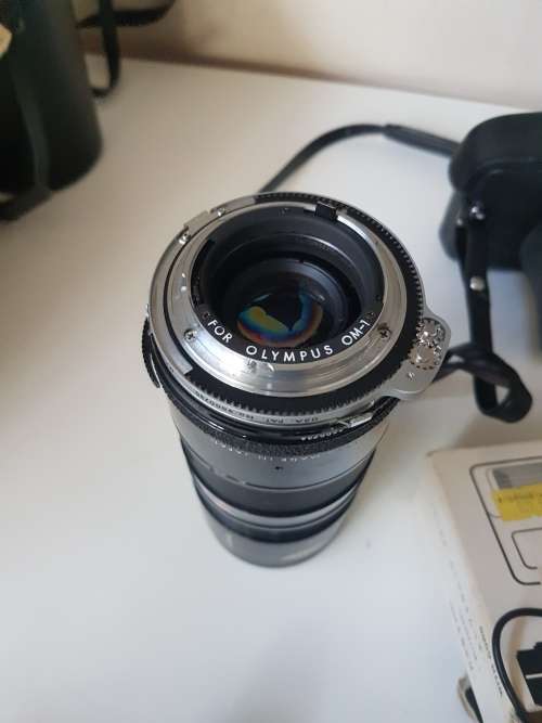 Olympus OM1 camera with lens, zoom lens, tripod, flash, cases, carrybag. Treasured possession.