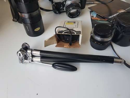 Olympus OM1 camera with lens, zoom lens, tripod, flash, cases, carrybag. Treasured possession.