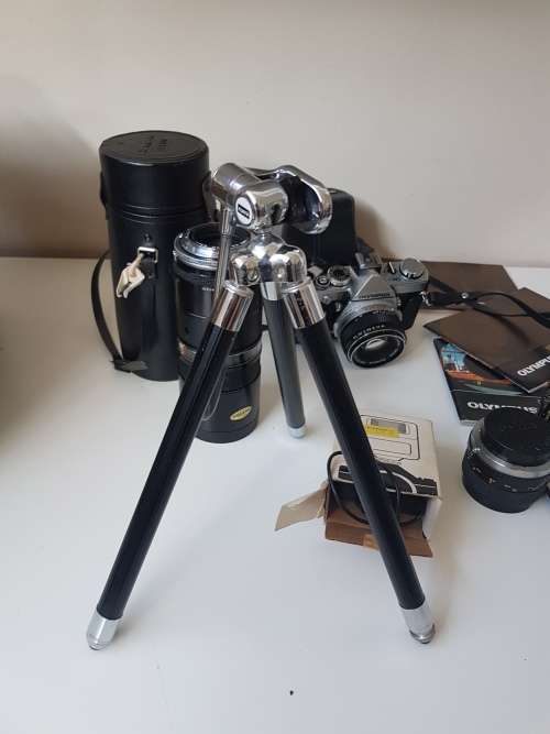 Olympus OM1 camera with lens, zoom lens, tripod, flash, cases, carrybag. Treasured possession.