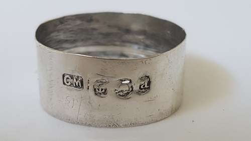 Solid sterling silver hallmarked ring.  Made from vintage bottle lid.