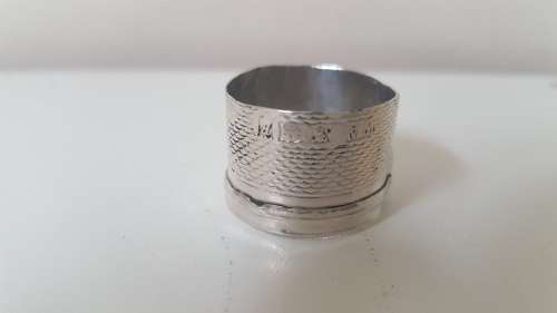 Hand made Sterling Silver ring. Engine turned pattern on the band. Hallmark on band as well.  4.1 g.