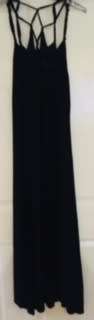 Rip Curl Black maxi dress with side slit Size: 10