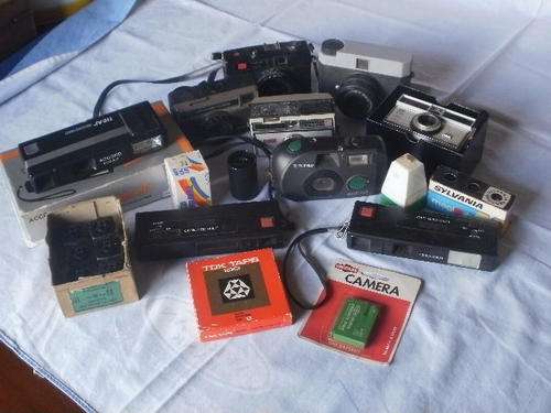 NINE VINTAGE CAMERA'S PLUS SOME ACCESSORIES. ALL FOR ONE BID