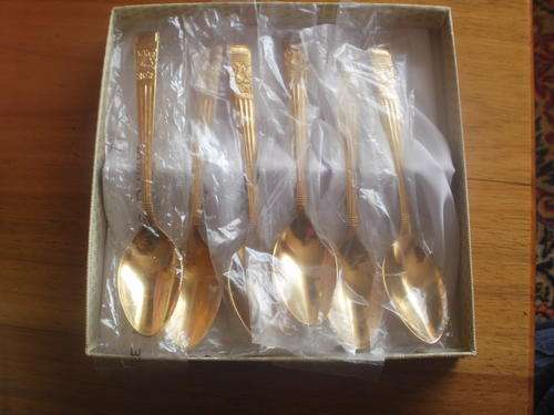 NTC 23 CARAT GOLD PLATED TEASPOONS. (a)