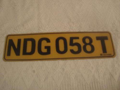 OLD YELLOW PERSPEX NUMBER PLATE