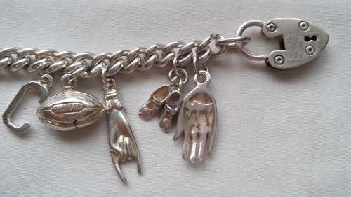 SILVER CHARM BRACELET (53.2GRAM)