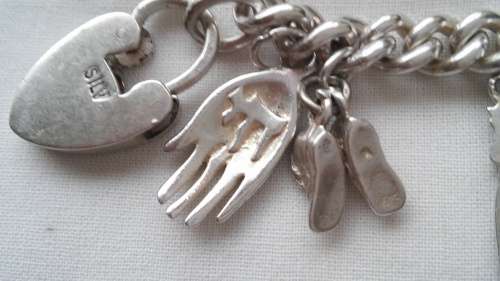 SILVER CHARM BRACELET (53.2GRAM)