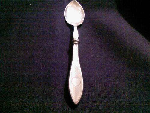 A HALLMARKED SILVER HANDLED SPOON STARTING AT R1