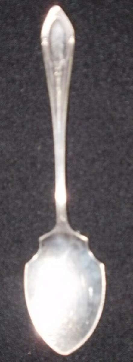 A NICE EMESS PLATE EPNS SUGAR SPOON