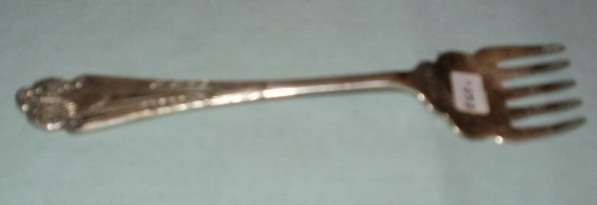 A VERY NICE ORNATE EPNS BREAD FORK