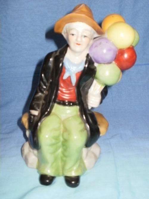 OLD MAN HOLDING BALLOONS