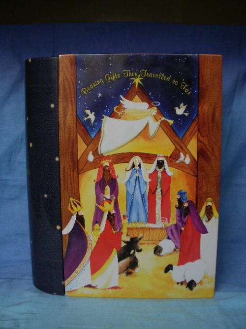 THE CHRISTAMS STORY TIN THAT LOOKS LIKE A BOOK