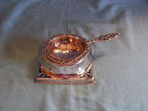 SILVER PLATED TEA STRAINER