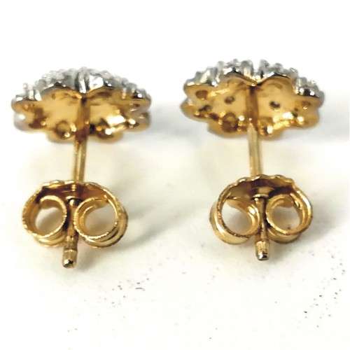 9 CT YELLOW GOLD DIAMOND FLOWER STUDS