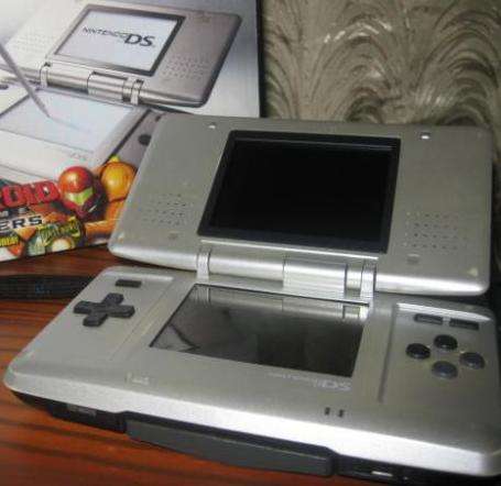 Silver Nintendo DS and Super Mario Game up for grabs R1 NO RESERVE Auction!