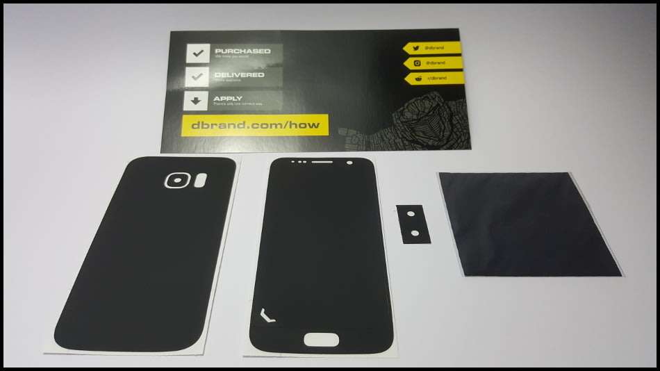 Samsung Galaxy S7 Duos Dual SIM | dbrand & Slickwraps Skins | Silver Titanium 32GB | Wireless Pad