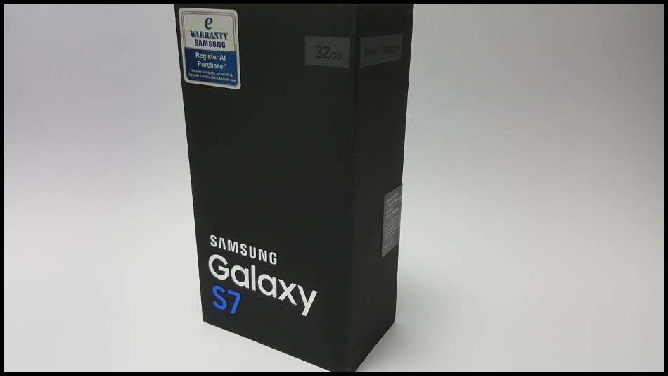 Samsung Galaxy S7 Duos Dual SIM | dbrand & Slickwraps Skins | Silver Titanium 32GB | Wireless Pad