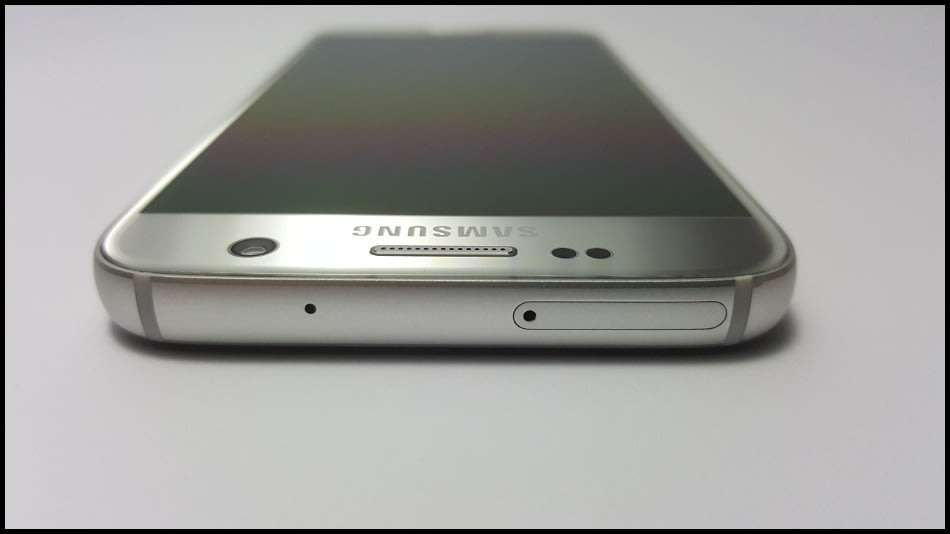 Samsung Galaxy S7 Duos Dual SIM | dbrand & Slickwraps Skins | Silver Titanium 32GB | Wireless Pad