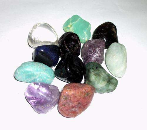A VARIETY OF TUMBLED HEALING CRYSTALS
