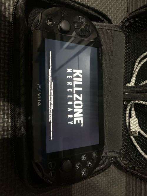 Sony PSVita console with Killzone Game and Hard case cover