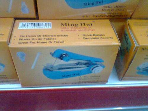 Hand Held Sewing machine