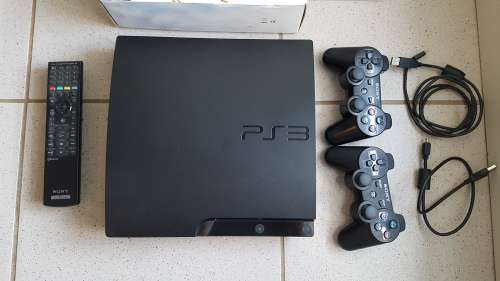 PS3 SLIM CONSOLE + 27 GAMES and ACCESSORIES