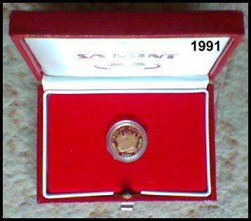 1991 - 1/10 Ounce Proof Gold Protea Nursing 100, Presented in a Round Capsule in a S. A. Mint Red Bo