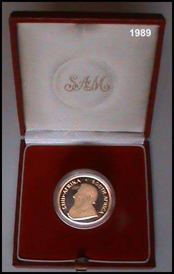1989 1 Ounce Proof Gold Krugerrand Sealed in a Round Capsule  in a S.A Mint Red Box.