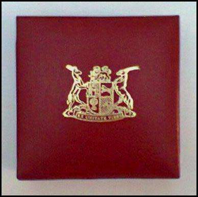 1989 1 Ounce Proof Gold Krugerrand Sealed in a Round Capsule  in a S.A Mint Red Box.