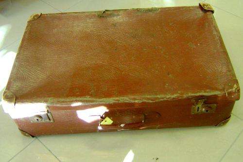 Large brown suitcase
