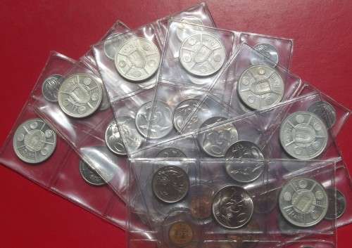 7 X 1974 MINT SETS WITH SILVER RAND. 15 GRAMS EACH. 80% SILVER. BID PER SET TO TAKE ALL 7.