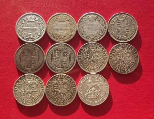 11 X ENGLAND STERLING SILVER SHILLINGS. 1846 - 1917. BID PER COIN TO TAKE ALL 11.