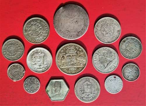 COLLECTION OF SILVER WORLD COINS.