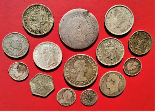 COLLECTION OF SILVER WORLD COINS.