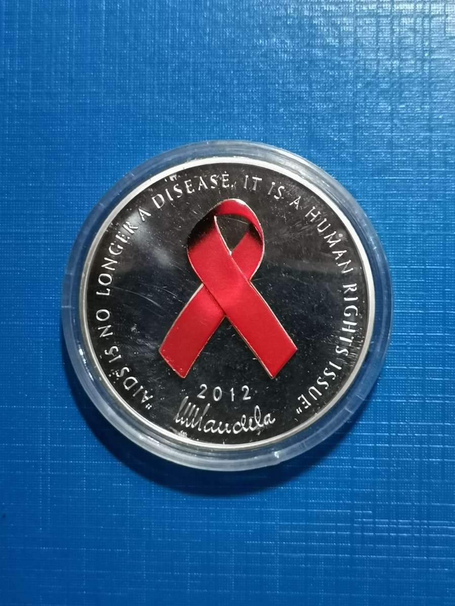 MANDELA / RED RIBBON 1 OUNCE SILVER MEDALLION. MINT OF NORWAY.