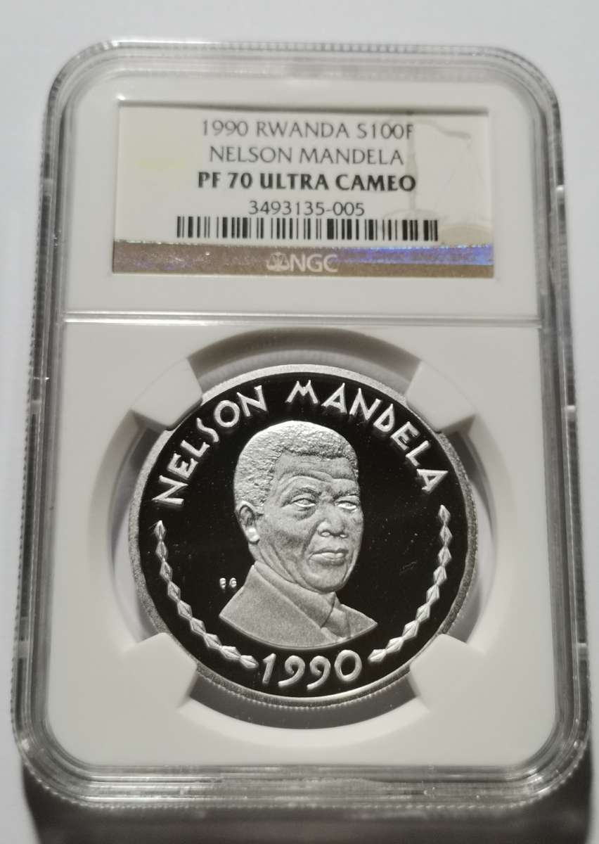 1990 RWANDA 1 0Z SILVER 100F MANDELA COIN. NGC PF70UC. HIGHEST GRADE AND SCARCE.