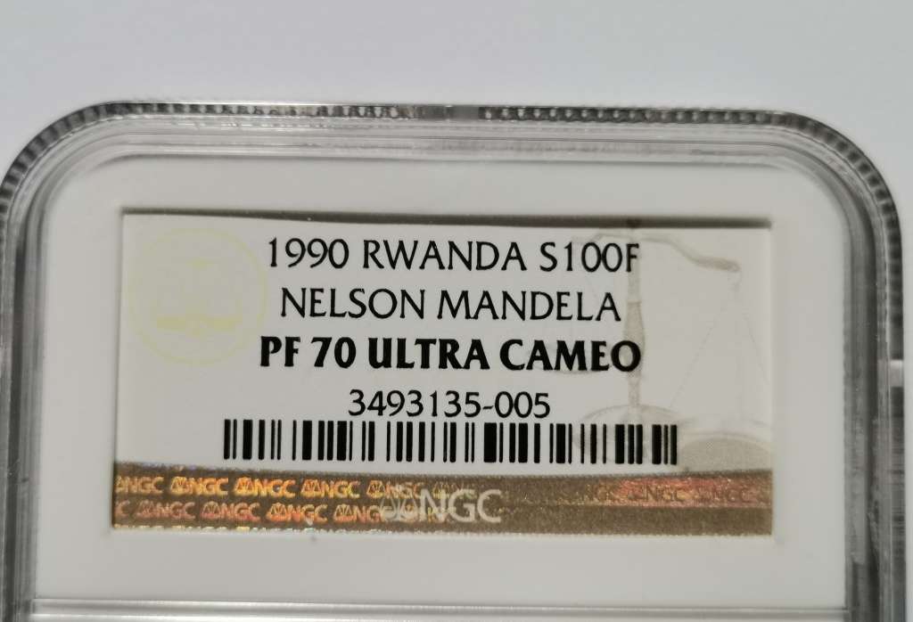1990 RWANDA 1 0Z SILVER 100F MANDELA COIN. NGC PF70UC. HIGHEST GRADE AND SCARCE.