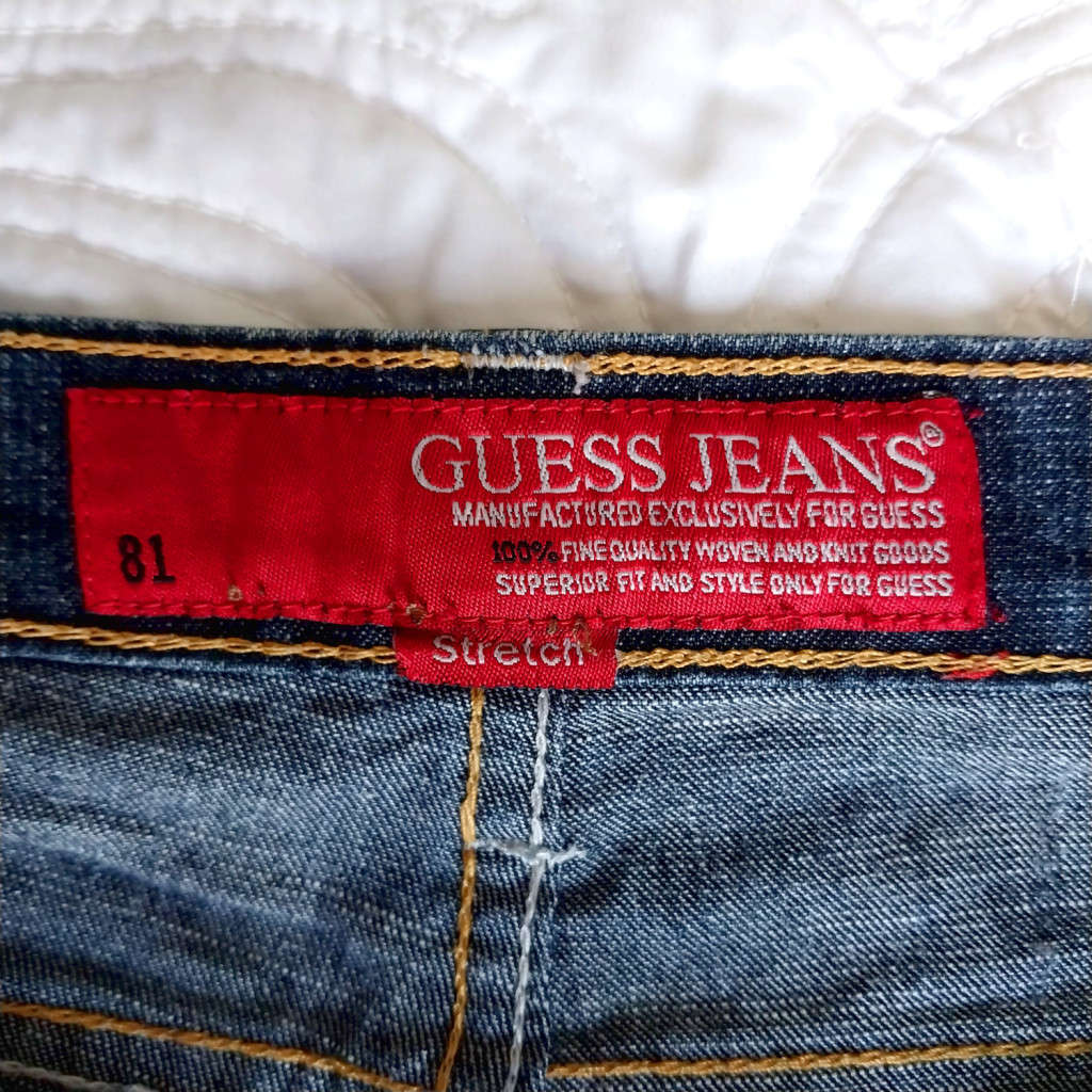 GUESS LOW-RISE BOOTLEG JEANS - DARK WASH