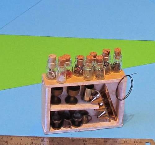 Miniature Dollhouse 1/12"  scale - workshop cabinet with brass cups and bottles of stuff :)