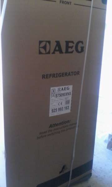 A New AEG Side by Side Fridge with home bar Model: S75090XNX