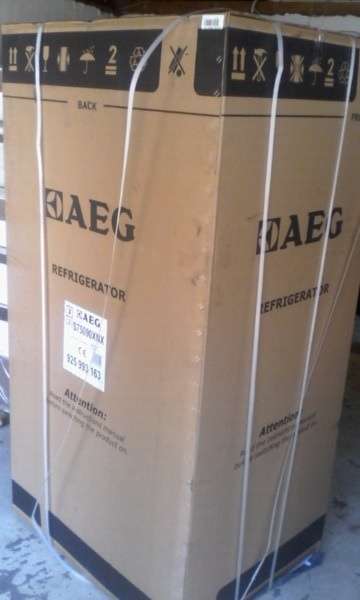 A New AEG Side by Side Fridge with home bar Model: S75090XNX