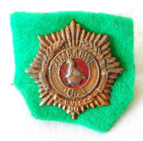 ZIMBABWE ARMY SERVICES CORPS-METAL CAP BADGE-RHODESIA