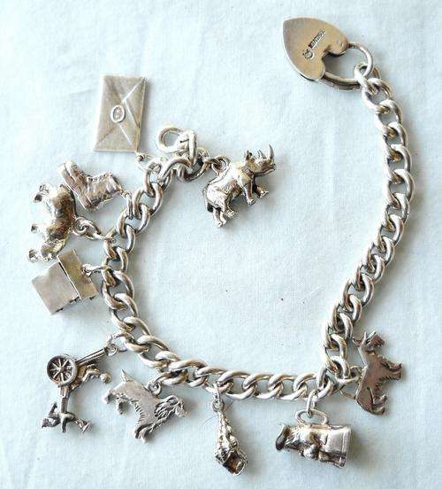 VINTAGE- SILVER CHARM BRACELET-10 CHARMS-50.5 GRAMS-EXCELLENT CONDITION