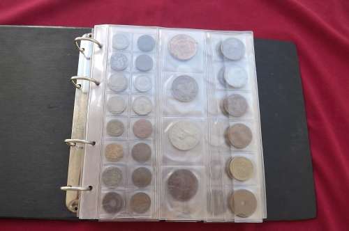 Album with various SA and International  interesting coins. 7 Pages.see scans.