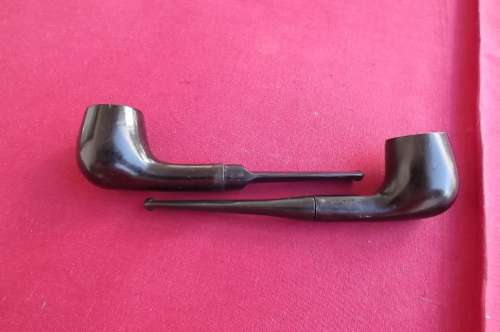 Lot of 2 different wooden pipes in as new condition.