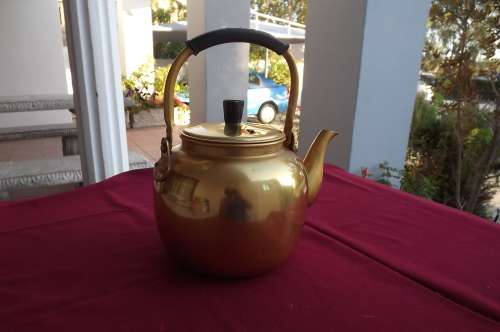 Stunning brass plate kettle with lid size  height with handle 29cm.By Camel made in Korea