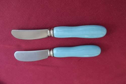Two Patee knifes with blue handles.Heavy.Length each 13.5cm. New condition.