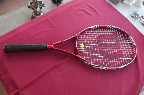 wilson Endure aluminium racket Cushion handle.Used but strings are fine.Complete length 70cm