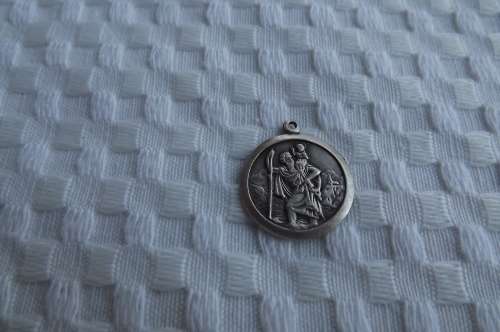 Beautiful St.Christopher 925 silver pendant 2cm diameter.Good condition