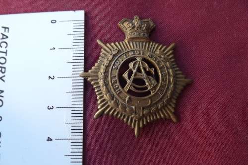 WW1- British the Army Service Corps badge 1914-1918.Both lugs